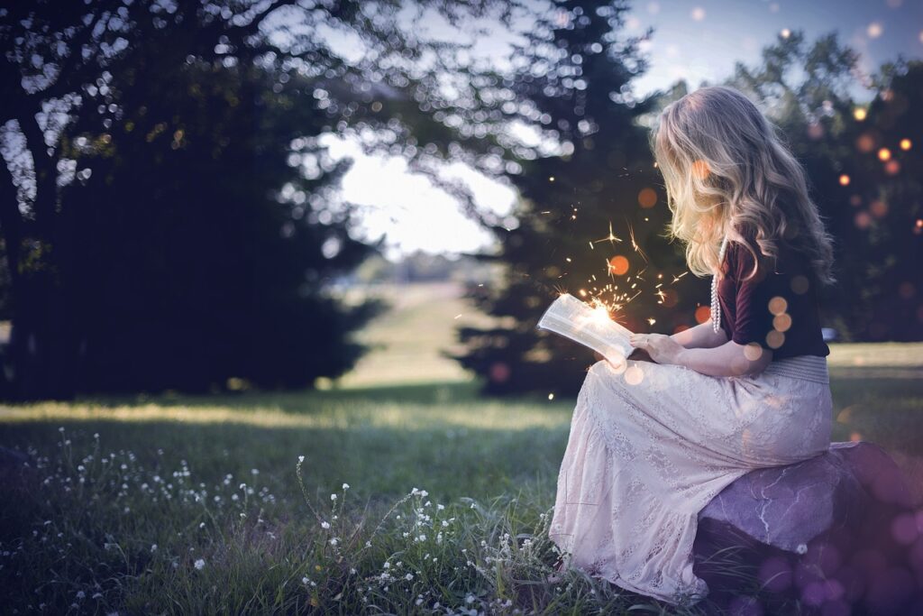 a book, girl, magic-4133988.jpg